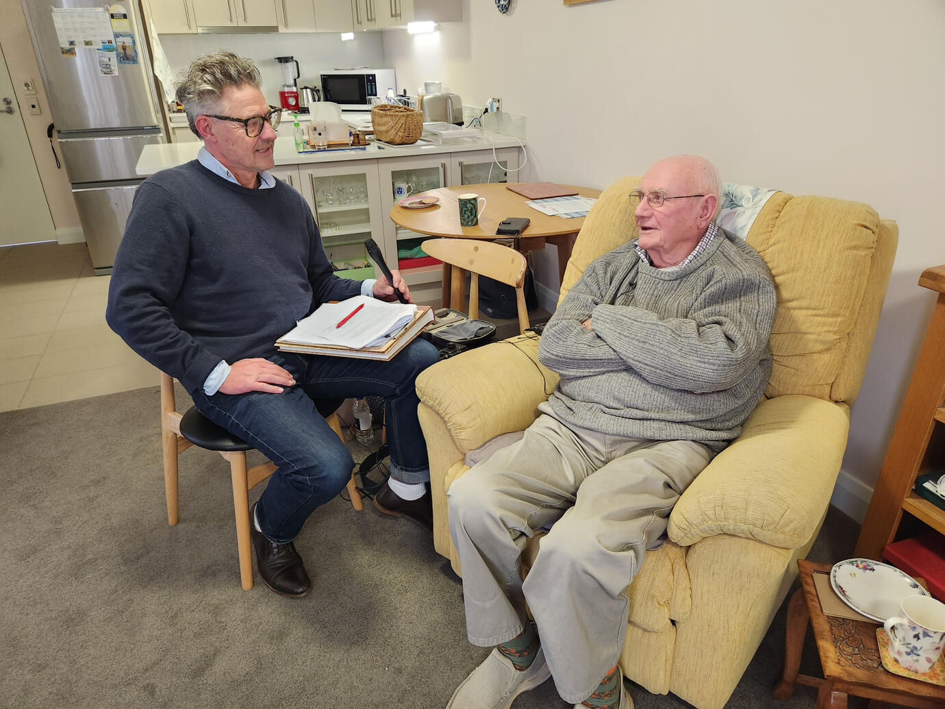 Cosmo Kentish-Barnes recording Tom Porter’s life story at home.